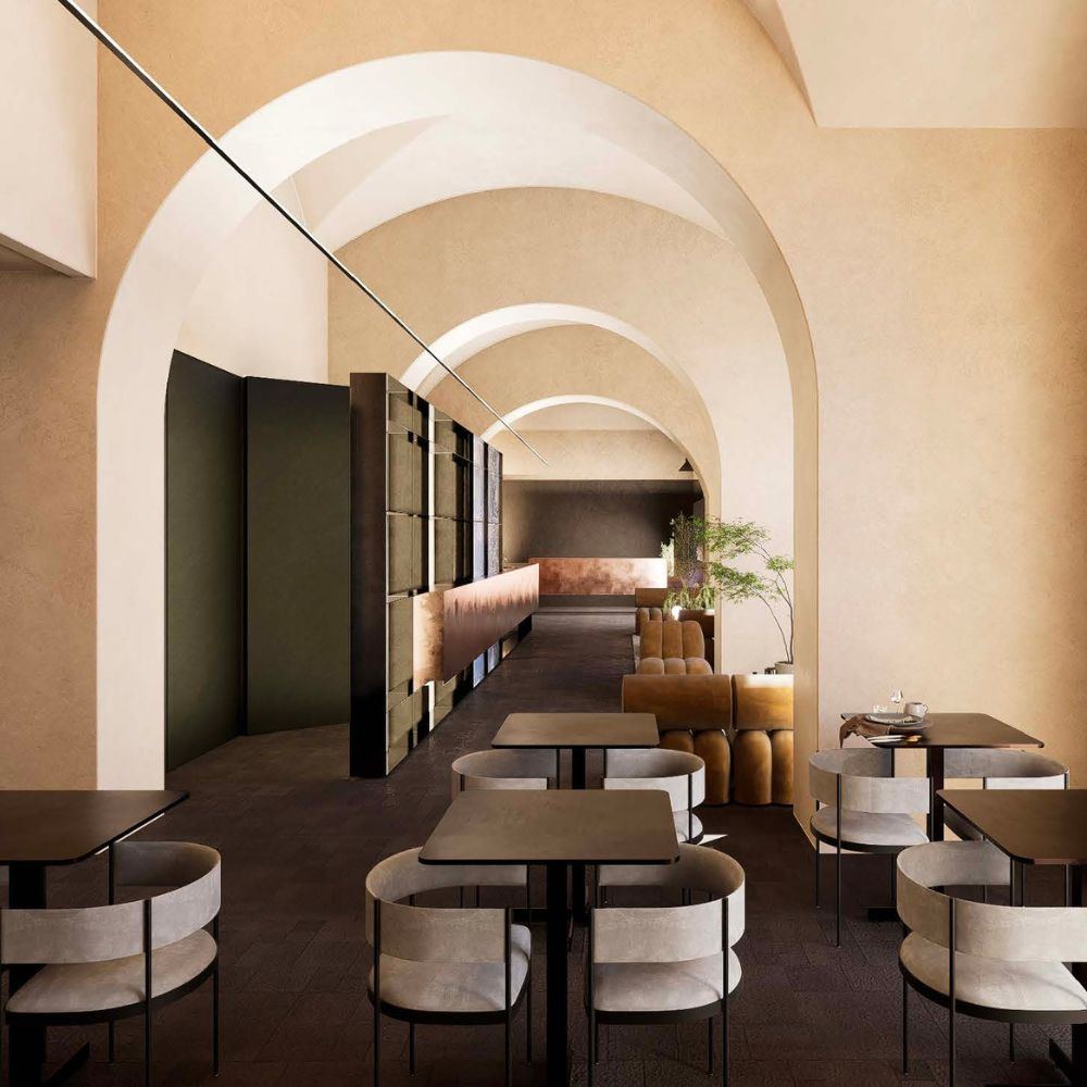 Vaulted lounge interior of a TerraPrima project, warm plaster and arched ceilings